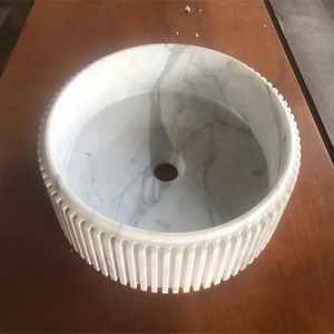 round marble vessel sink