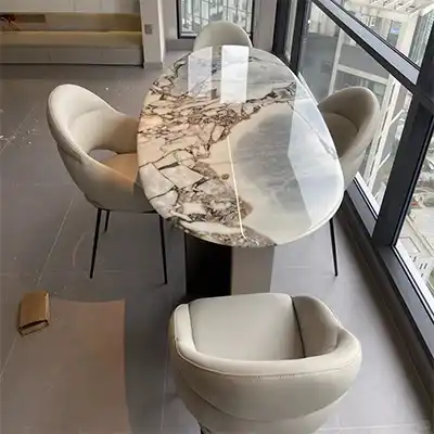 Marble oval dining table of calacatta