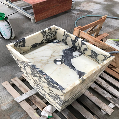Purple marble pedestal sink