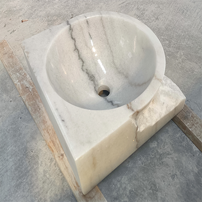 White marble vessel sink