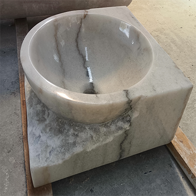 White marble vessel sink