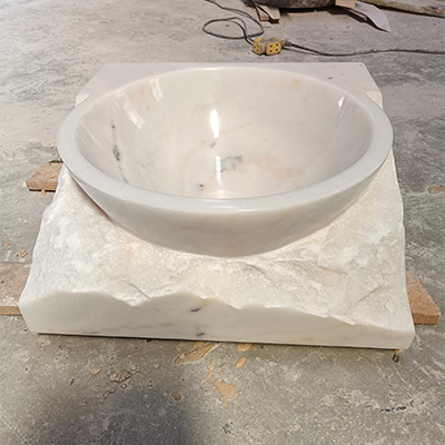 White marble vessel sink