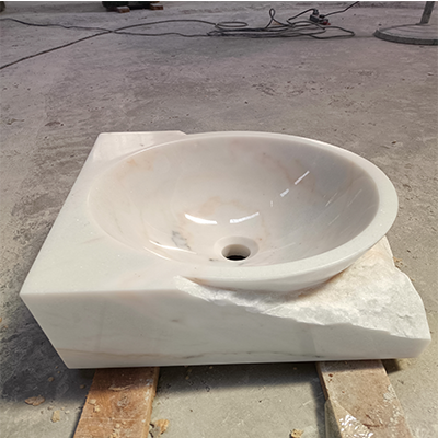 White marble vessel sink