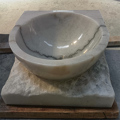 White marble vessel sink