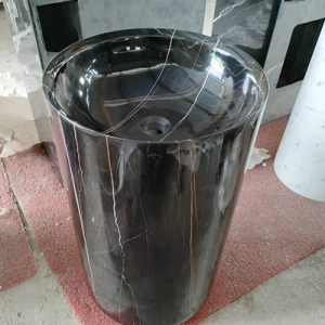 black marble pedestal sink