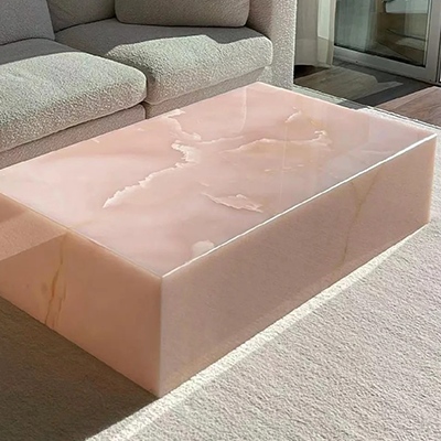 Custom pink onyx coffee table of home