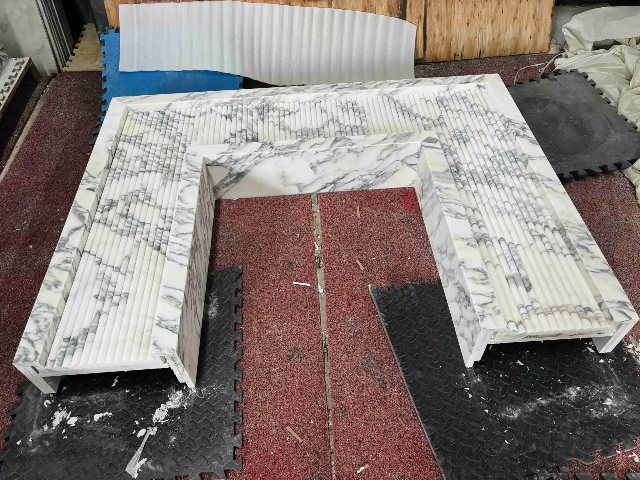 white marble fireplace of Arabescato