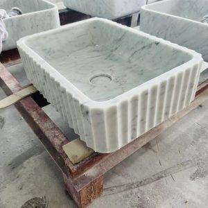 white marble wash basin