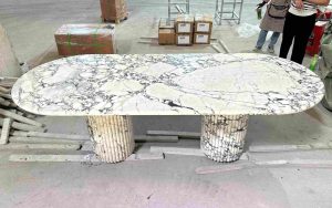 hite oval dining table in marble